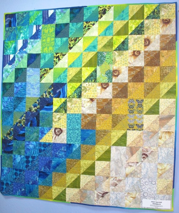 Half-Square Triangles by Diana McClun and Laura Nownes, p. 40 of Quilts! Quilts!! Quilts!!! 3rd edition Half-Square Triangles by Diana McClun and Laura Nownes, p. 40 of Quilts! Quilts!! Quilts!!! 3rd edition