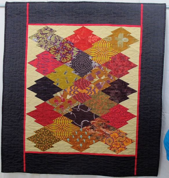 Japanese Eggplant by Susan Lambert, quilted by New Pieces Japanese Eggplant by Susan Lambert, quilted by New Pieces