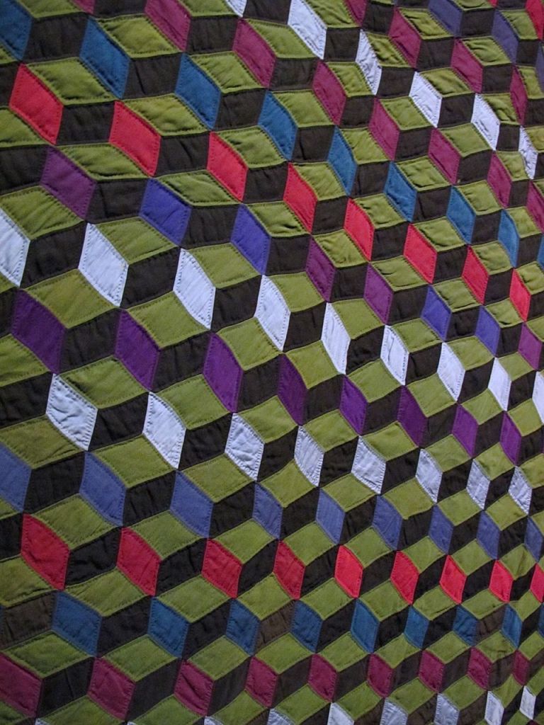 Tumbling Blocks, c. 1900-10. Ann K. Yoder, formerly from Lancaster County, Pennsylvania. Purchased from Sam E. Hershberger. Holmes County. Wool.