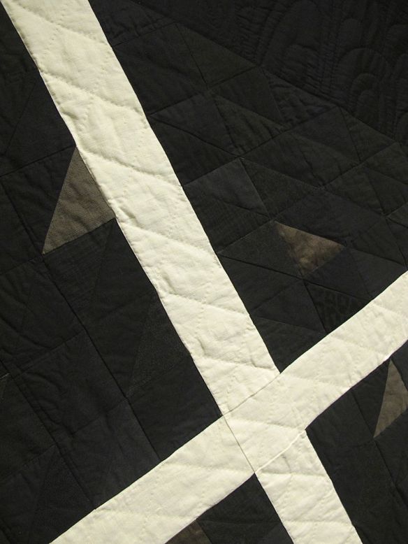 X by Stacey Sharman, 2014. Cotton, linen, wool, denim, and upholstery samples. Machine and hand quilted. X by Stacey Sharman, 2014. Cotton, linen, wool, denim, and upholstery samples. Machine and hand quilted.