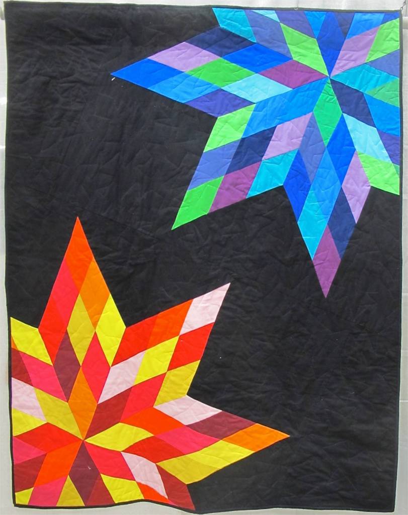 Sunrise Sunset by Katherine Dithmer, League City. TX. Pieced and quilted by Christina Powell.