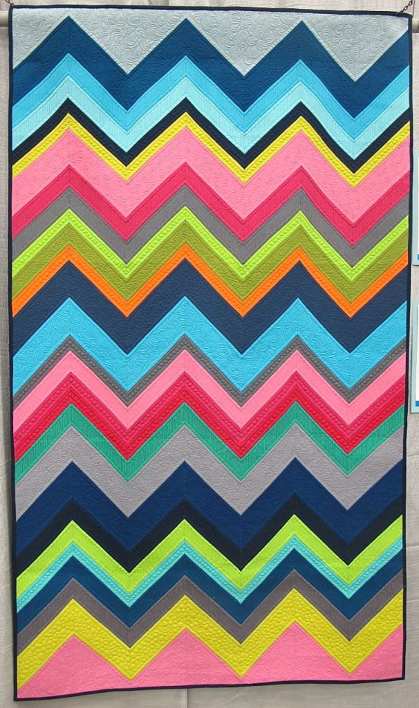 Modern Chevron Remix by Cynthia Whitten. Ladera Ranch, California. Quilted by Helen Baczynski.