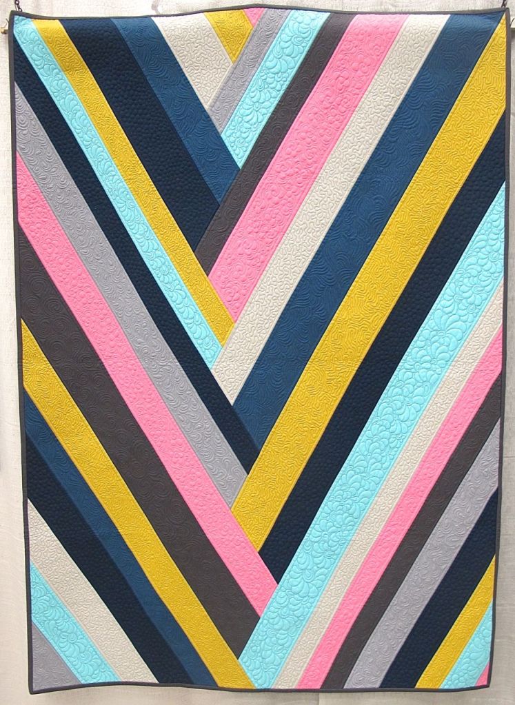 Vega by Cynthia Whitten. Ladera Ranch, California. Quilted by Helen Baczynski.