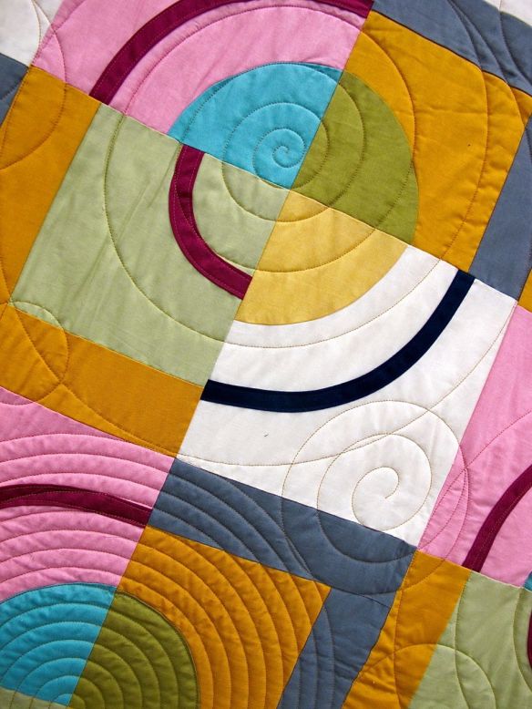 Orbits by Amy Stevenson. Ann Arbor, Michigan. Quilted by Kathy Koch of Thread Bear Quilting. Pattern available though Pink Castle Fabrics.