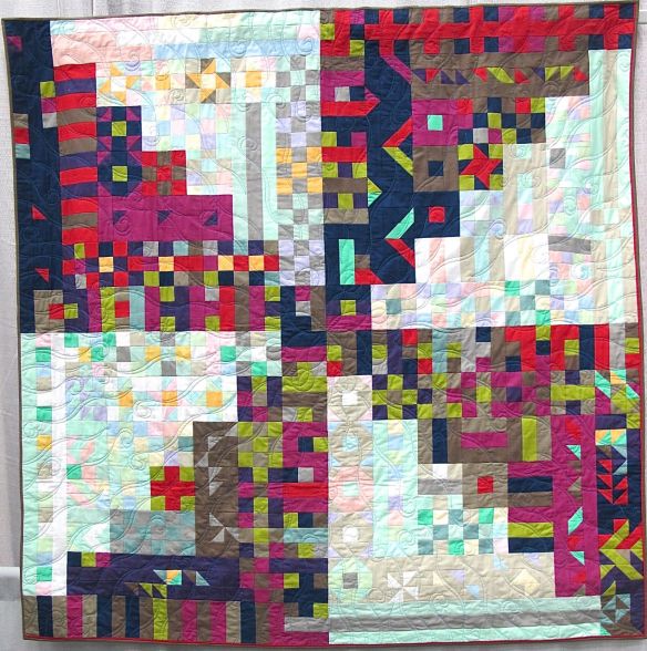 Propelled Pixels by Kim Lapacek. Poynette, Wisconsin. Quilted by Barbara Raisbeck.