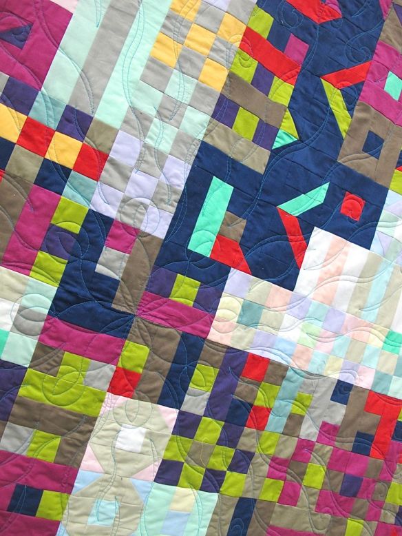 Propelled Pixels by Kim Lapacek. Poynette, Wisconsin. Quilted by Barbara Raisbeck.