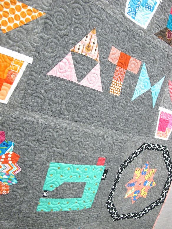 UFO Challenge by Heather Grant, pieced byCorinne Sovey, BethChinderle, Jill Ivie, Emily Thompson, Christs Carew, Mary Anne Williams, Angela Milliman, Gina Pina, Kim Place. Quilted by Gina Pina.