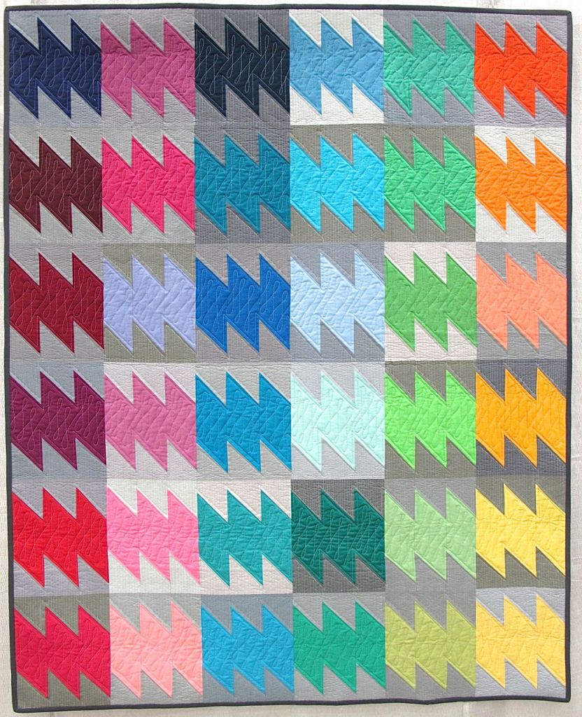 Quilt #6 by Sarah Rodriguez. San Antonio, Texas. Pieced by Kelli Saffill and member of the San Antonio MQG. Quilted by Danielle Wilkes.