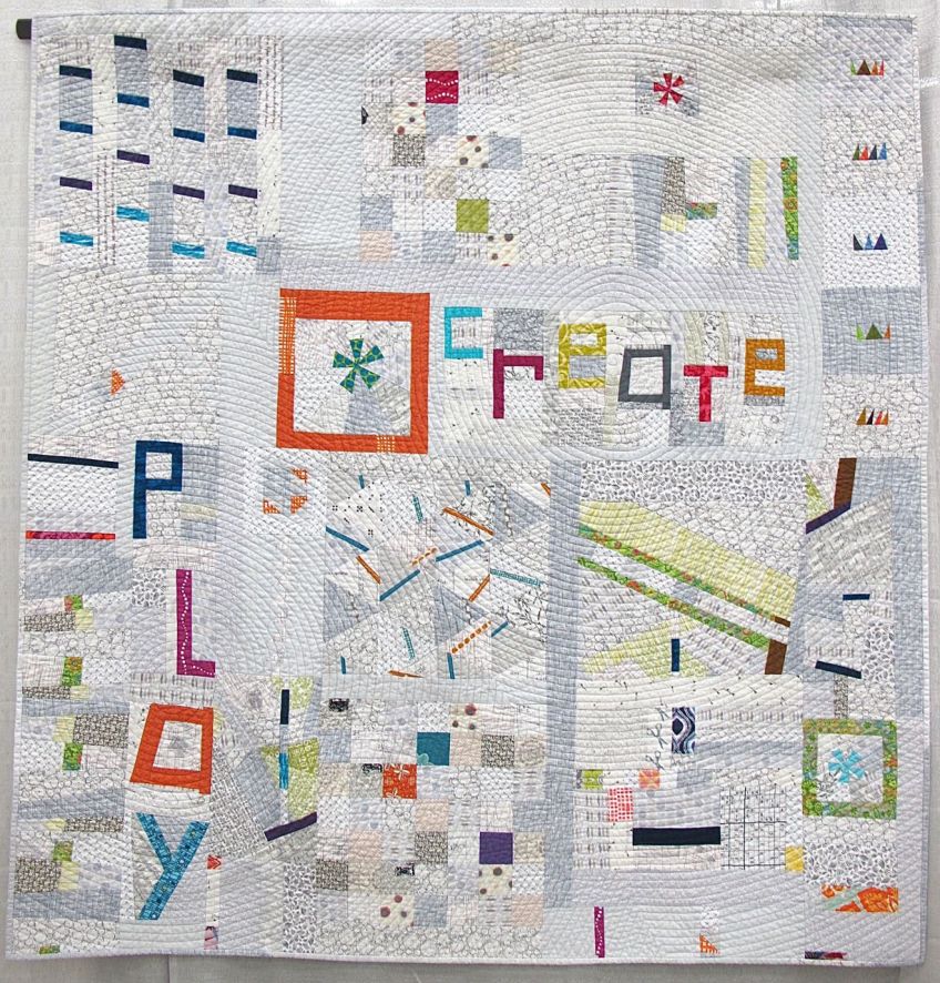 Playing with Little Bits by Rose Daley. Columbia Maryland. Pieced by Anna Levengood, Jill Safford, Jessica Skultety, Jessica Levitt, Robin Tillsworth, Rachel Singh, Elizabeth Timmons. 1st place, Group or Bee Quilts. QuiltCon 2015.