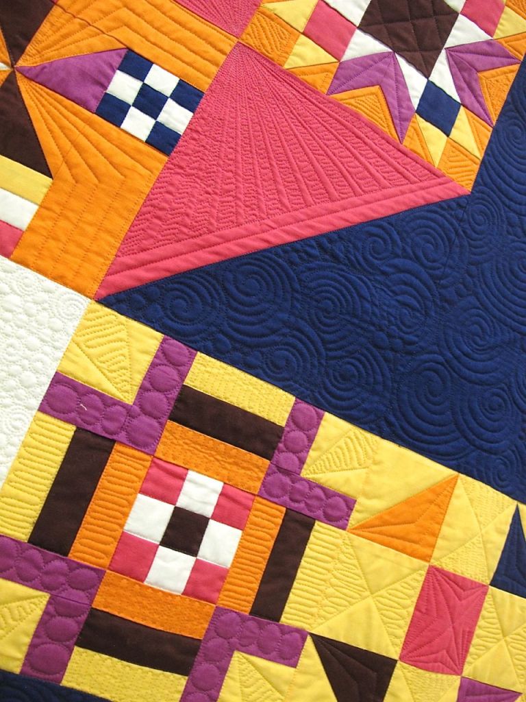 Moccasin by Anne Marie Chany. Plain City, Ohio. Quilted by Mindy Powell.