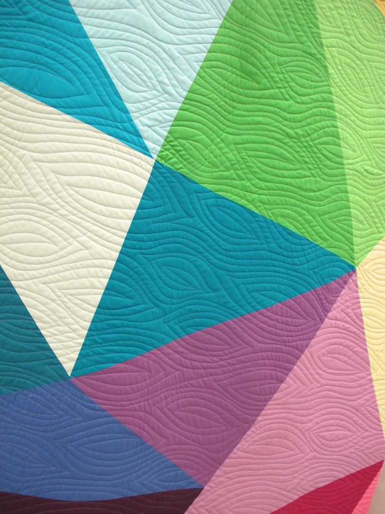 Fractured Triangles by Paula Leber. Merriam, Kansas. Quilted by Denise Pitts Best.