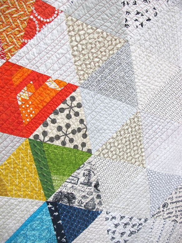 Rainbow Triangles. Silver Spring, Maryland. Pieced by Kat Drinkwater, Jennifer Ferriss-Salter, Mai Flourry, Briawna High,Lisa McGriff, Dhia Peach, Gabrielle Robles, Kari Stewart, Carla Voorhees, Jouise Wackerman. Quilted by Carla Voorhees.