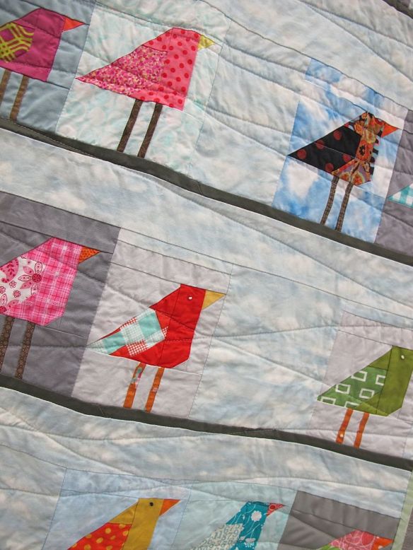Birds on a Line. Austin, Texas. Pieced by Jeannette Day, Lindsey Rhoads, Leah Newman, Alison Robinson, Alex Duenkel, Tamara Hampton, Diane Stanley, Christine Horlbeck, Alexis Day. Quilted by Jeanette Day. Using McCalls Quilting bird block.