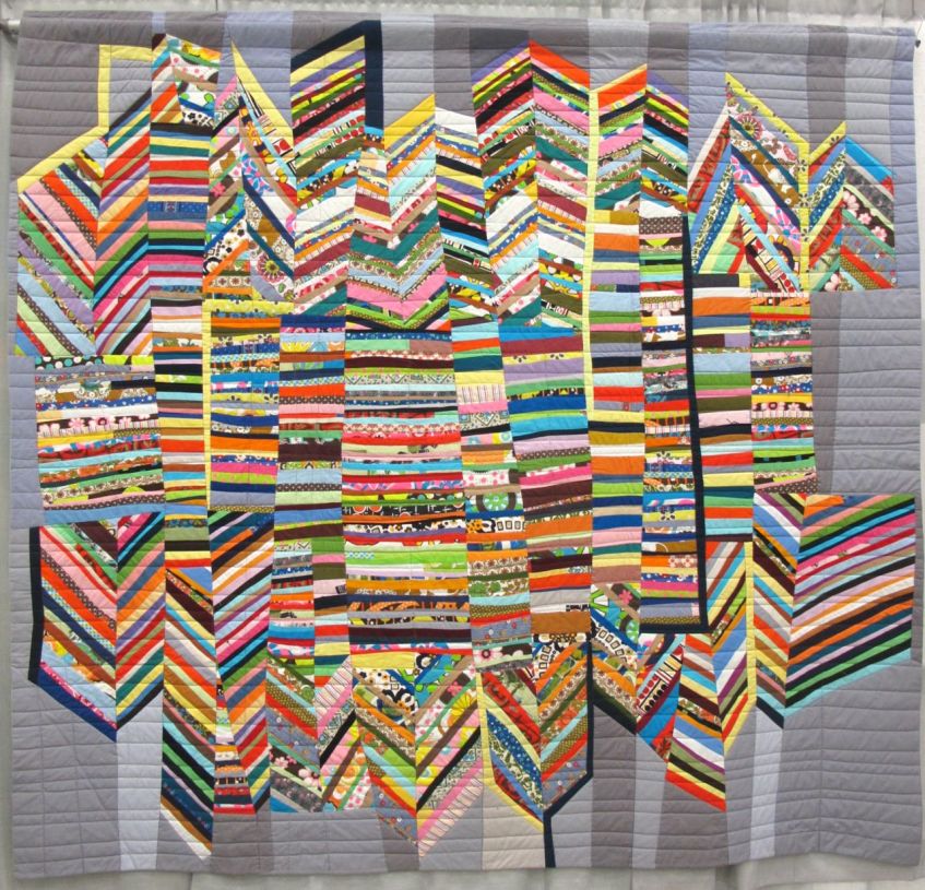 Score for Strings: City by Sherri Lynn Wood. Oakland, California. Quilted by Sue Fox.