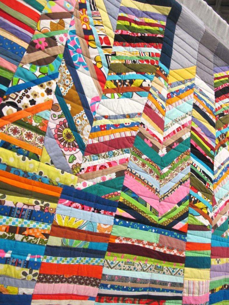 Score for Strings: City by Sherri Lynn Wood. Oakland, California. Quilted by Sue Fox.