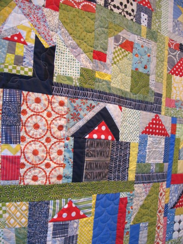 The Neighborhood by Terri Carpenter with Calerie Gibbons, Chancy Fessler, Anna Carloni. Quilted by Terri Carpenter.