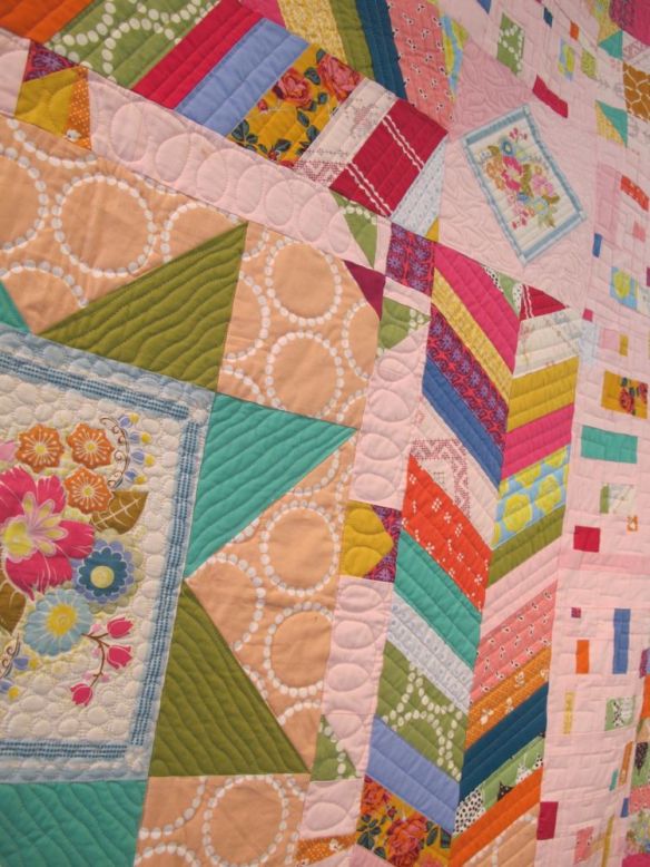 Carousel by Anna Carloni with Terri Carpenter, Chancy Fessler, Valerie Gibbins. Quilted by Terri Carpenter.