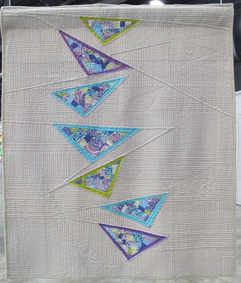 Diving Geese, designed and pieced by Katie Pederson, quilted by Krista Withers. Seattle, Washington. Best Machine Quilting award, sponsored by Interweave. QuiltCon 2015.