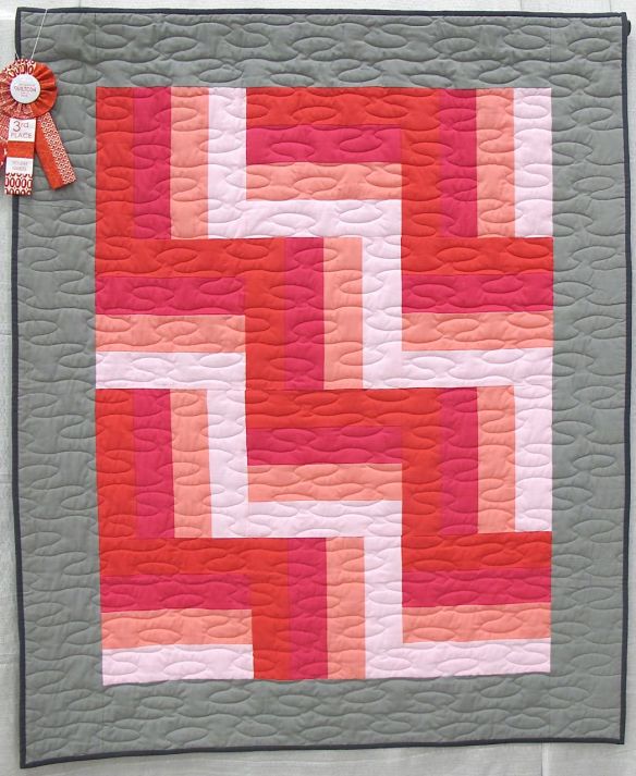 Rothko's Dream by Evie Guigley, Hernando Mississippi. Mom helped cut the rotary strips. Original design, 1st time using a long arm with instruction from Mrs. Teresa Pino, Quilts2aT Studio. 3rd Place, Youth Quilts, QuiltCon 2015.
