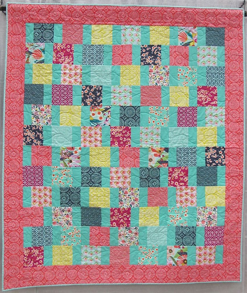 Side Step by Kate Ivie. Austin, Texas.Original design at age 10. Quilted by Kate on a long arm at The Cotton Cupboard in Lakeway, Texas.