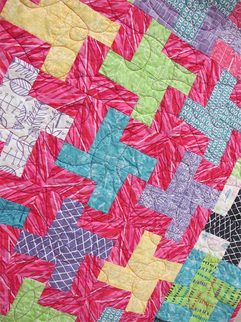 Pinwheels by Kate Ivie. Austin. Texas. Pattern, "Mardi Gras" from Villa Rosa Designs. Started ar age 9. Quilted on a long arm at The Cotton Cupboard in Lakeway, Texas.