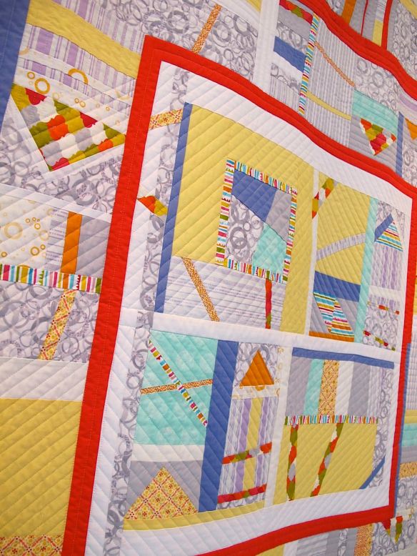 Sherbert Sunrise by Valerie Gibbins with Chancy Fessler, Terri carpenter, Anna Carlini. Quilted by Terri Carpenter