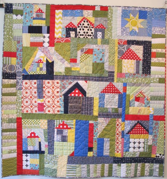 The Neighborhood by Terri Carpenter with Calerie Gibbons, Chancy Fessler, Anna Carloni. Quilted by Terri Carpenter.