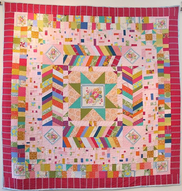 Carousel by Anna Carloni with Terri Carpenter, Chancy Fessler, Valerie Gibbins. Quilted by Terri Carpenter.