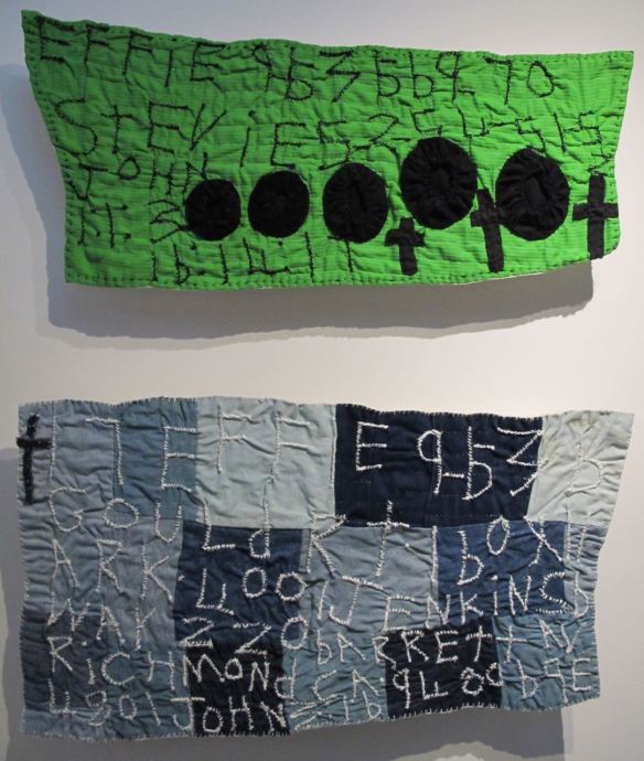 Black yo-yos on green hanging and 17 Patches. Pieced by Rosie Lee Tompkins, quilted by Irene Bankhead.Collection of Eli Leon