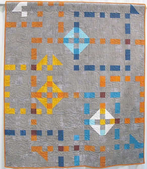 Churn Dash Boogie-Woogie by Mickey Beebe, quilted by Toni McAuliffe