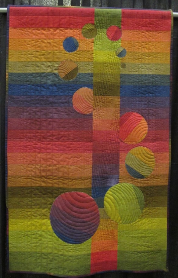 Orbit by Patti Henderson Auburn, quilted by Beth Foust Orbit by Patti Henderson Auburn, quilted by Beth Foust