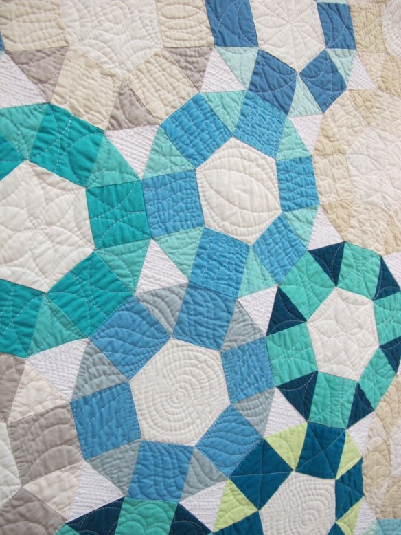 Cog by Emily Cier, quilted by Angela Walters Cog by Emily Cier, quilted by Angela Walters
