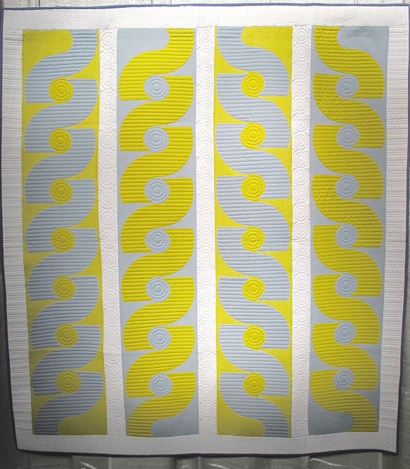 Roundabout by Nancy Thornburg, quilted by Natalia Bonne Roundabout by Nancy Thornburg, quilted by Natalia Bonne