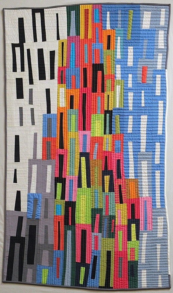 Metropolis by Pam Rocco, quilted by Tami Levin. 40"x62". 2015 Metropolis by Pam Rocco, quilted by Tami Levin. 40"x62". 2015
