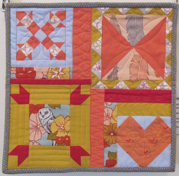4 Square at the Shed by Mary Burnett and Kristen Takakuwa, quilted by Kristen Takakuwa