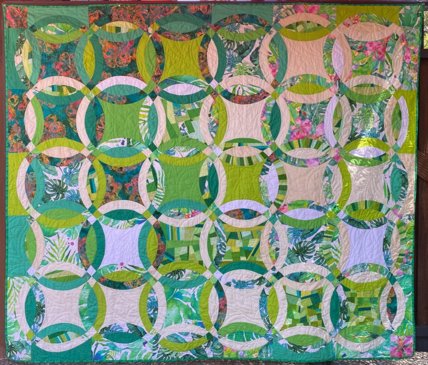 For Daas and Dean by Carol Van Zandt, quilted by Hello Stitch. 82" x 70"